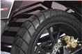 Block-pattern tyres add a touch of off-road ability, but there is no additional suspension travel on offer.