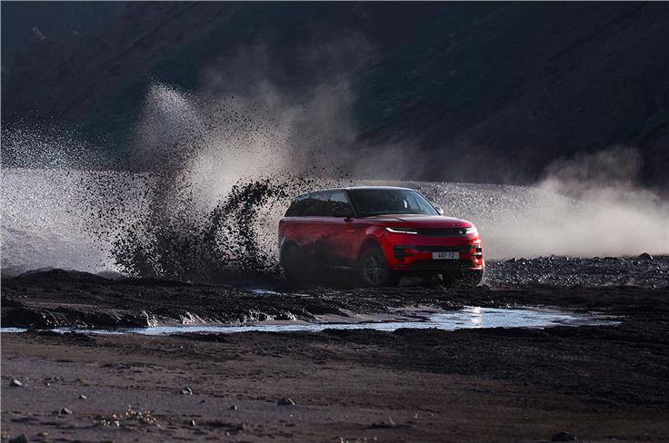 2022 Range Rover Sport sliding through mud.