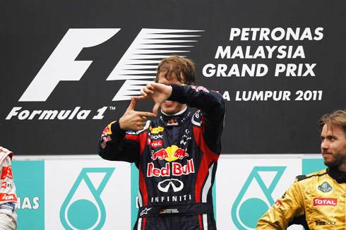 Vettel eases to victory in Malaysia