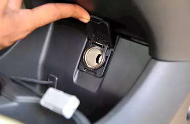 USB and power outlet socket is ahead of the gear knob. 