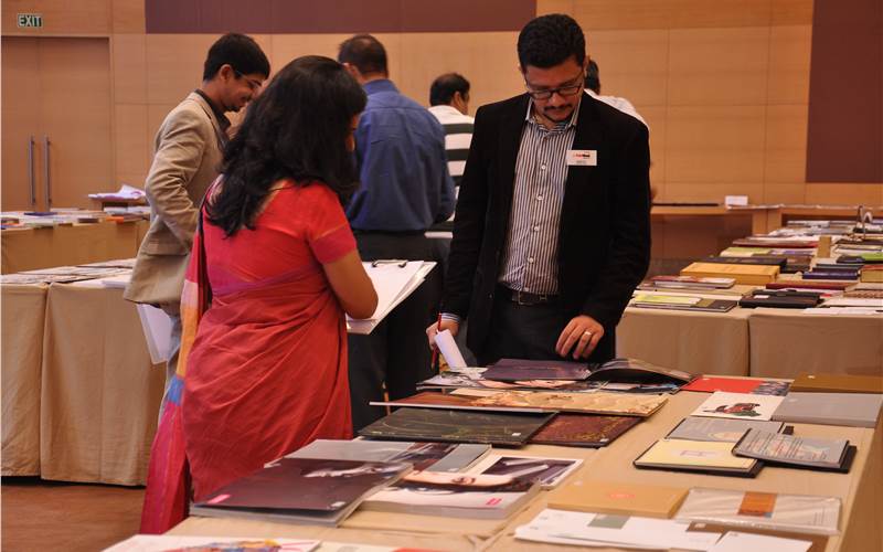 Sheetal Dandekar, senior product manager, Lupin India and Saurav Roy, director of Idea Spice Design examine catalogues and brochures
