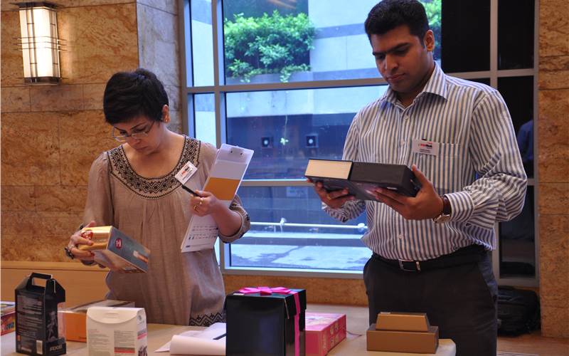 Ashwini Deshpande, founder director, Elephant Design and Yogesh Bambal, packaging development manager, Cadbury India taking a close look at the packaging  entries