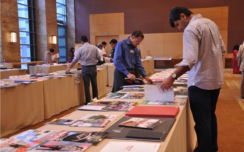 Suresh Ramakrishnan, publisher of Haymarket India roll-up his sleeves in order to go through thousand print samples