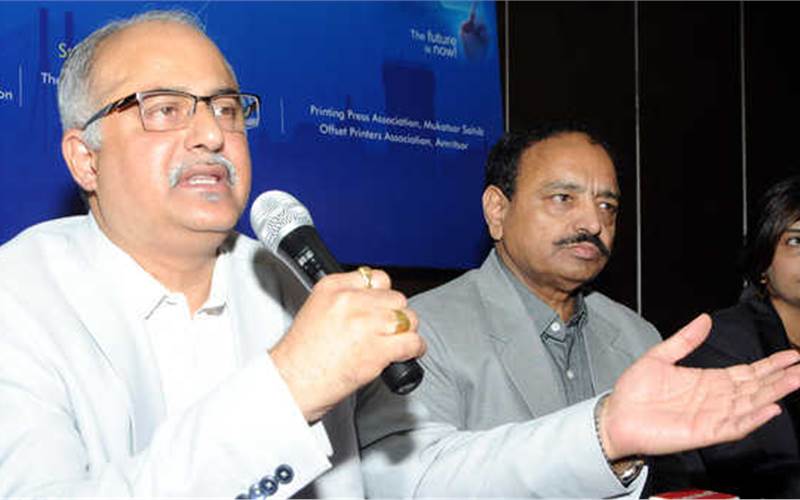 (from left) Tushar Dhote and Kamal Chopra during the press conference