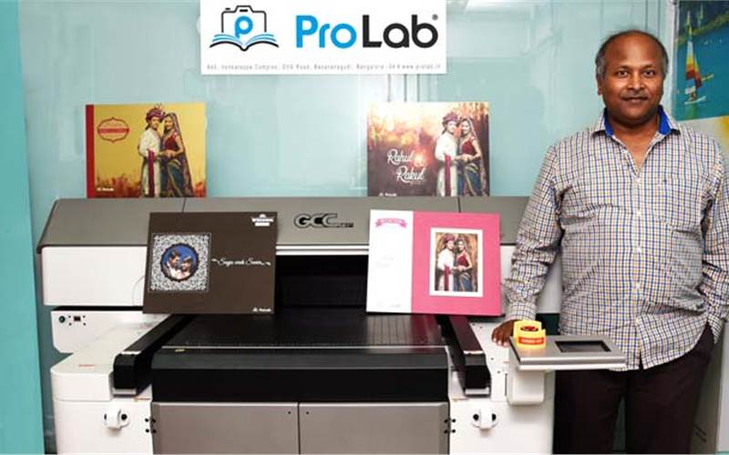 P Naveen Kumar of Pro Lab with the GCC UV flatbed printer