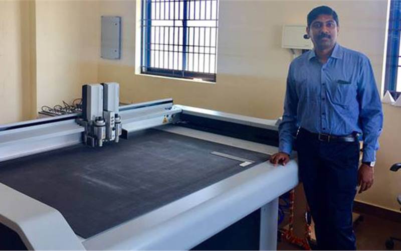 Krishna Subramanian, the owner of Suri Graphix with the Zund S3 800