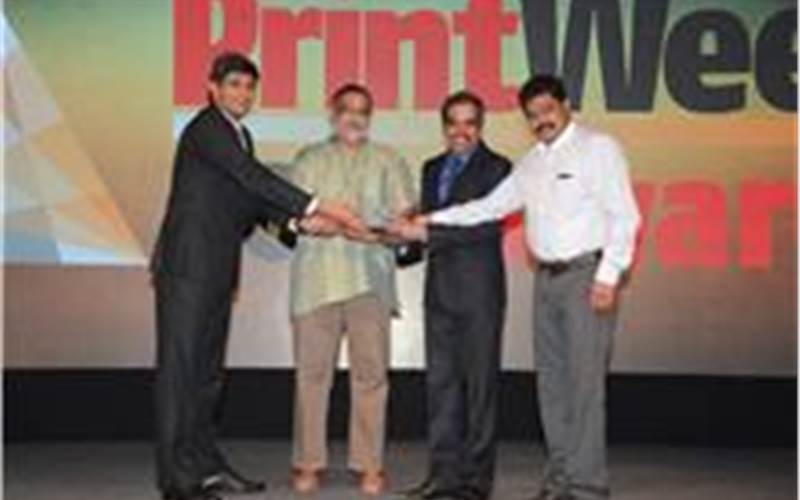 Quenby Transfers India being honoured with the PrintWeek India Printing Company of the Year Award 2014