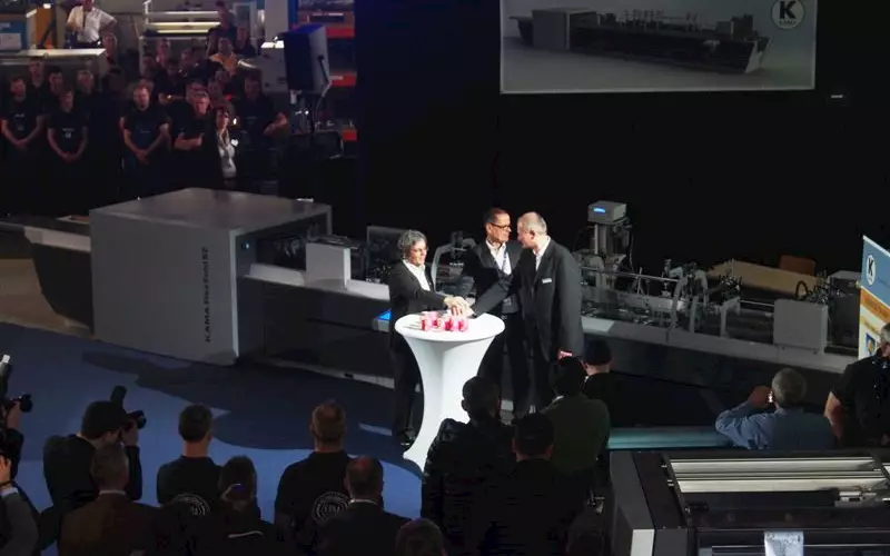 Marcus Tralau, CEO, Kama, Steffen Pieper, managing director, Kama and Alon Bar-Shany, VP and GM, HP Indigo start the engines of the Flexfold 52 prototype which was being demonstrated for the first time