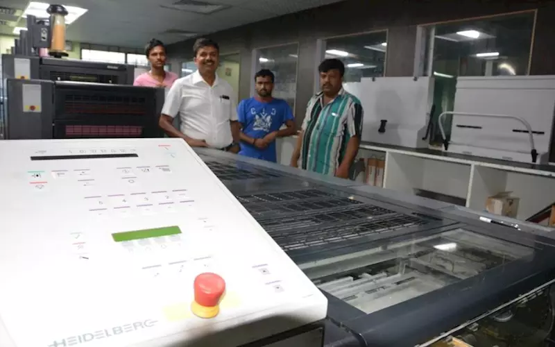 <a href="http://www.printweek.in/News/401613,four-heidelberg-anicolor-installs-in-india.aspx" style="color: white" target="_blank">BH Srinivas with his team, who feel the Anicolor is more capable when it comes to colours because of the anilox rollers, which allows the print job to take more ink where you need to run the colour a bit stronger</a>