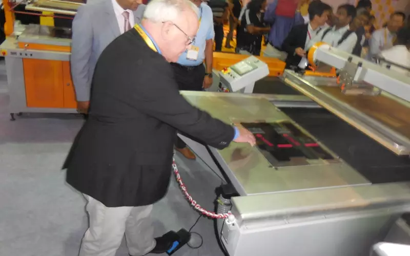 Mike Young of Imagetek Consulting International introduced Grafica Nano-Print screen printing machine with an auto take off system at the show