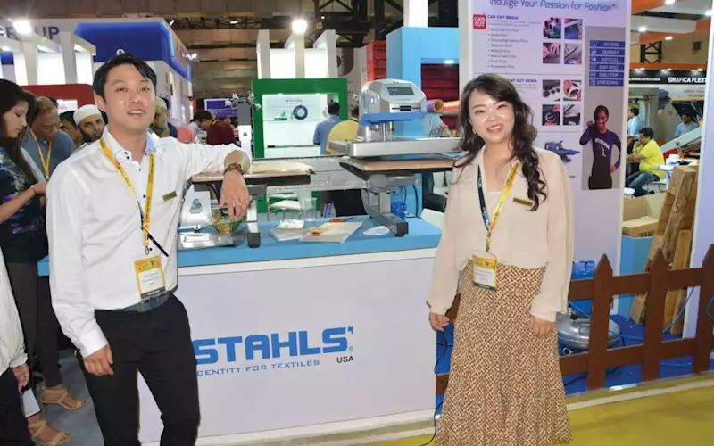 (r) Victoria Kong, manager, Stahls at the Skyscreen stall
