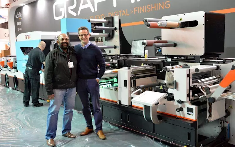 Amitabh Luthra of Printers Supply with Edale&#8217;s managing director James Boughton next to the Graphium Hybrid, a digital printing technology with flexo printing and finishing Edale has produced in collaboration with FFEI and Xaar.
