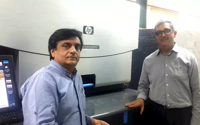 (from left) Sanjay and Pradeep Hora with the HP Indigo WS6000