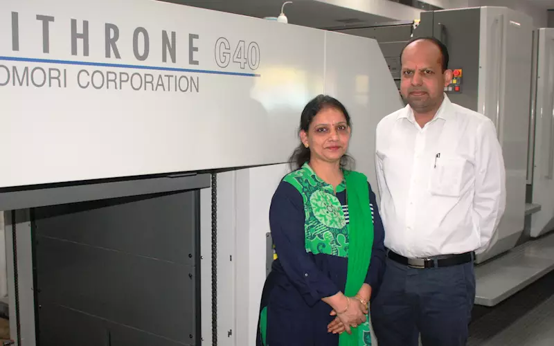 Pratibha and Rajiv Goyal of Gospel Press with the Komori Lithrone G40