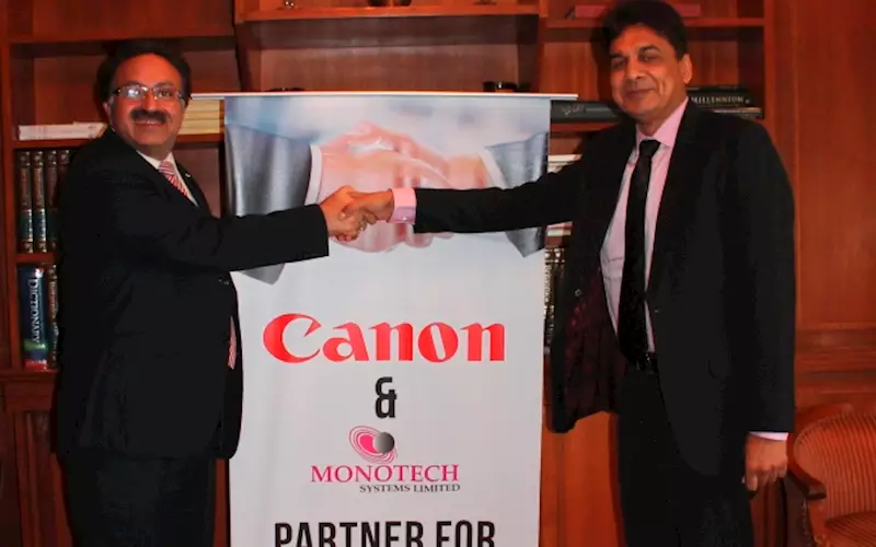 (l-r) Alok Bharadwaj of Canon India and TP Jain of Monotech Systems