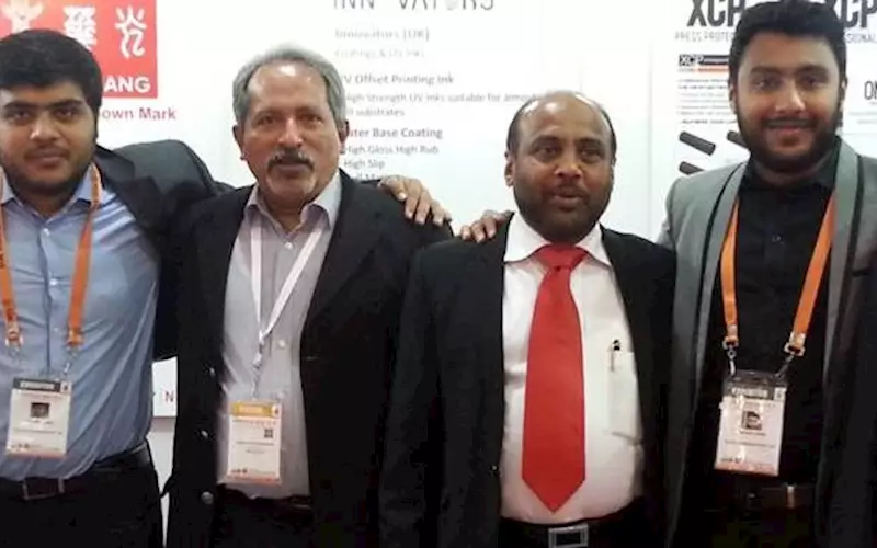 K Abraham of 3N Vision with Suresh Shah and sons Naineel and Kaushil during
XCP product launch at PrintPack India 2015