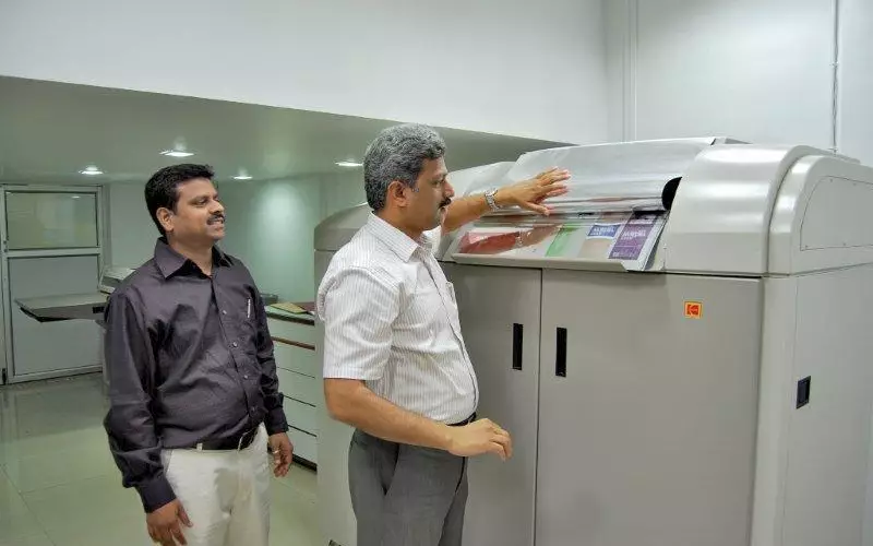 Anil Namugade, managing partner at Mumbai-based Trigon is delivering quick and superior-quality copies with his Kodak digital proofing line
