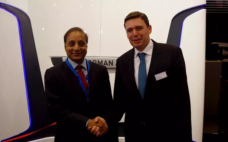 Ravi Dhariwal, CEO, Times Of India and Kuisle sign the deal for Regioman towers at the Manroland Web Systems stall