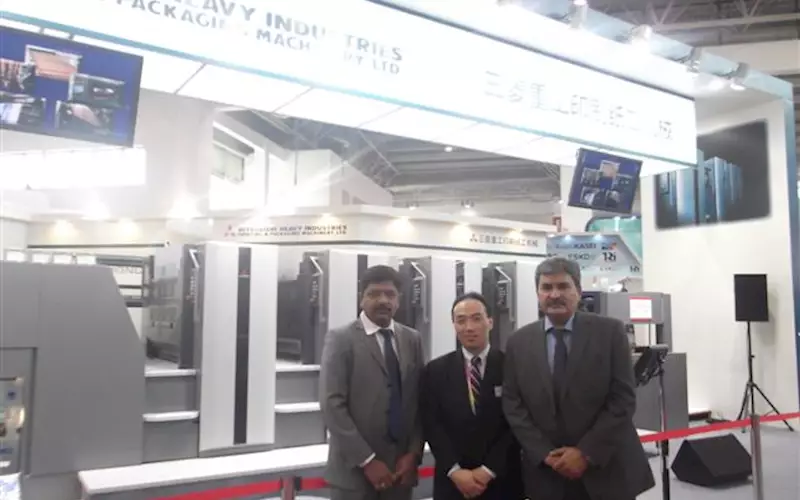 N Pradeep (l) and Vinay Kaushal (r) of Provin Technos, the Indian representative of Mitsubishi with Yasushi Miyamoto of Mitsubishi. The company showcased the Diamond V3000AS sheetfed press with mechanical type simultaneous plate-changer