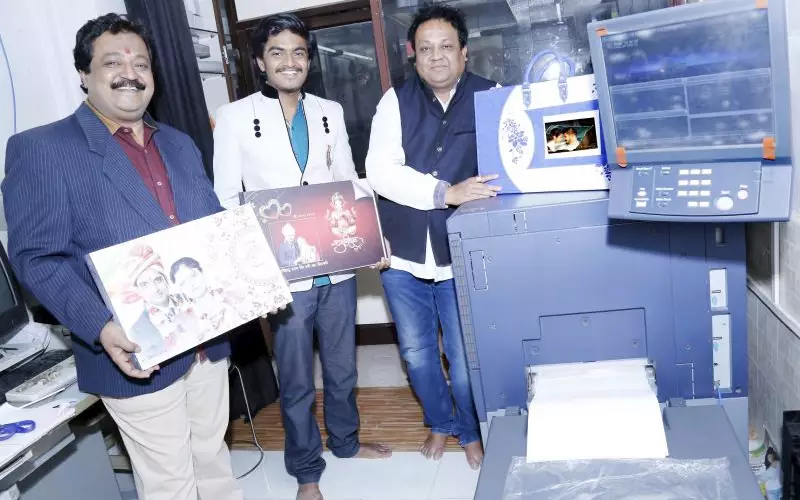Sanjay Jadhav (left), managing director, Top Today’s Magic Photo Lab, with others