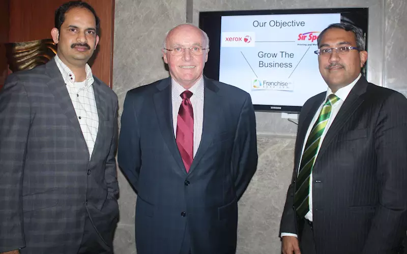 L-R: Chandrajit Narraa and John Bowen of Sir Speedy and Pankaj Kalra of Xerox India.