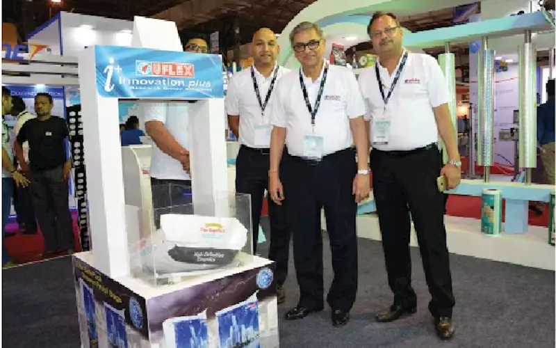 Amit Ray (in the centre) with water proof cement bag from Uflex