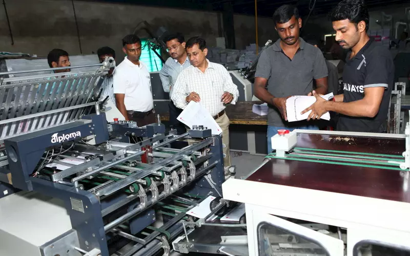 The printing firm houses a range of Welbound products which produce textbooks for Kerala, Karnataka and Tamil Nadu textbook society. In picture is Diploma 4Z3X combination folding machine with four buckles and three knives