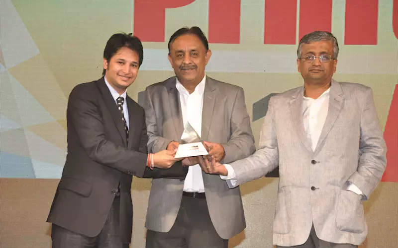 Kunal Vohra (far left) receiving the PrintWeek India Green Printing Company of the Year 2014 Award