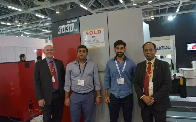 Chhatwal (second from left) and his son Krish flaked by Team Xeikon