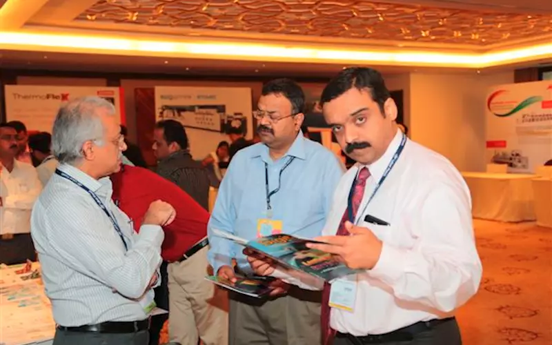 Satish Nayak (centre) highlighted the colour gamut in the digital print samples produced on the Surepress at Sai Packaging in Bengaluru
