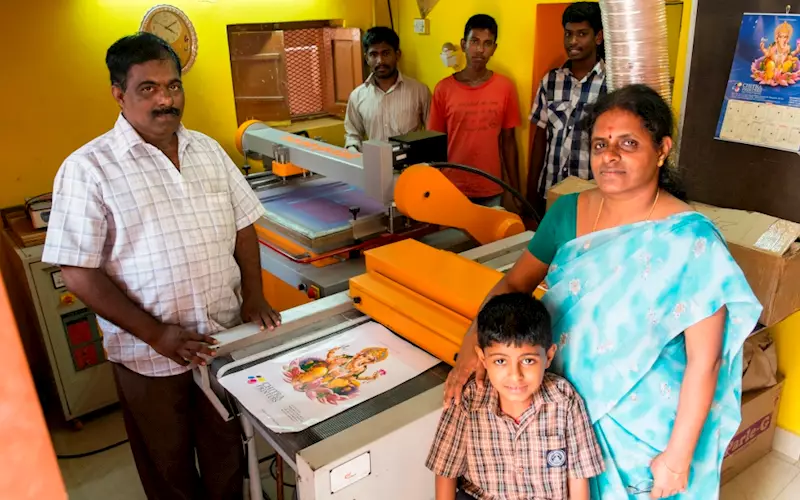 Bhuvaneshwari P of Chitra Printers, Bengaluru, with her family