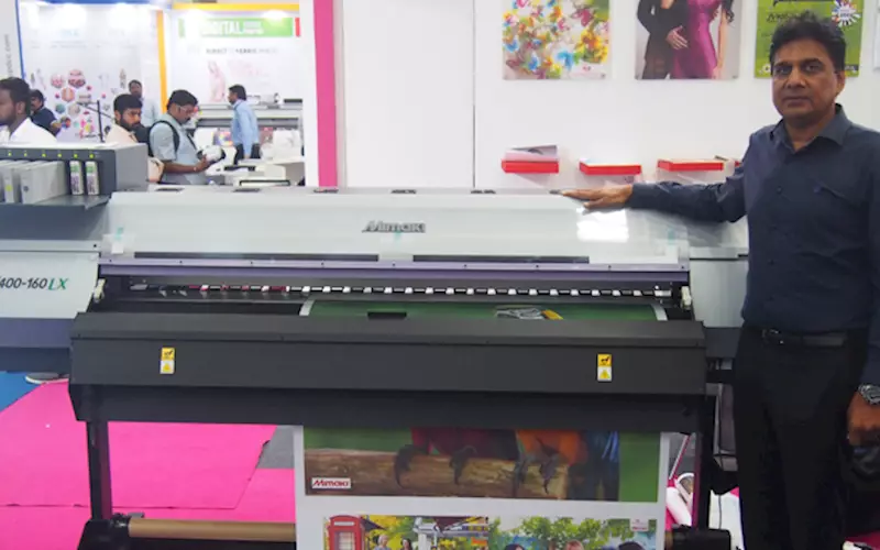 T P Jain with the Mimaki latex printer