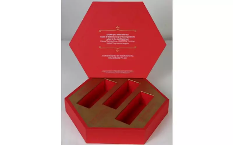 The hardbound Diwali gift box with die-cut was made for Dupont Nutrition & Health. The job, with print run of 400 was screen printed in gold and white colour, and was digitally printed on roma red 120 gsm paper