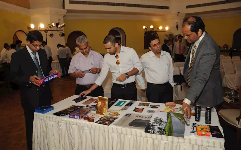 Arvind Sekhar, Dharamvir Jain of Paras Offset, Shobhit Bhargava of HBD Packaging; and Vasudevan and Ramprasad of Epson take a peek at the PrintWeek India Award samples