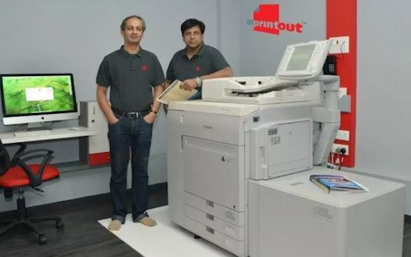 (from left) Shantanu V Kulkarni and Aniruddha M Gumaste of Inprintout Creation with the new Canon Imagepress C600