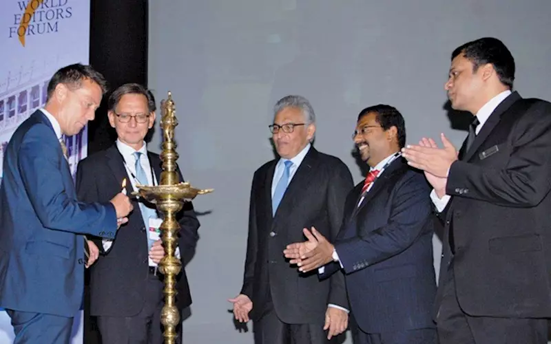 Wan-Ifra president, Tomas Brunegard lighting the lamp at the inaugration of Publish Asia 2013
