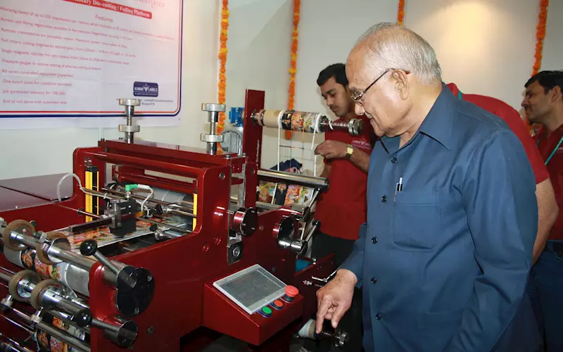 M K Bhargava, chairman of Kumar Printers inaugurating the machine