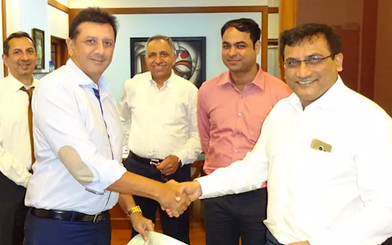 (In the photograph left to right, front row, are: Pradeep Shah (MD, Manugraph) inks agreement with Jigish Chiniwala (director of Condot ) back row, left to right – Sanjay Shah ( VC and MD, Manugraph ), I K Dogra (GM sales), and Babul Chatterjee (assistant manager marketing, Condot)