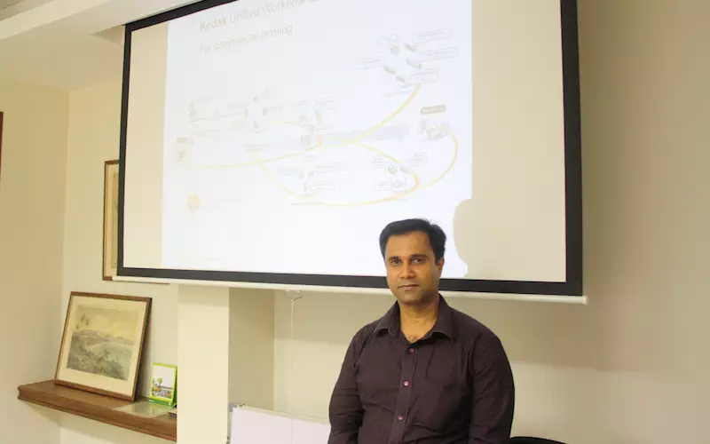 Prashant Kamath helps demystify Kodak Unified Workflow Solutions (UWS) for PrintWeek India at its Mumbai office