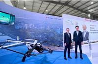 L-R: Toshihiro Suzuki, Representative Director and President of Suzuki, and Tomohiro Fukuzawa, CEO of SkyDrive in front of the 20% scaled SkyDrive SD-05 aircraft at the Vibrant Gujarat Summit 2024.