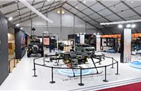 On display at the Kia Pavilion at ADEX 2023: (L-R) a medium-sized chassis, hydrogen fuel cell multi-copter drone, EV9 military concept car, and a hydrogen fuel cell military drone concept.