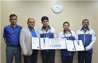 S Punnaivanam, Hyundai Motor India's VP and National Head for Aftersales, (second from left), felicitating the winners Sanchit and Ram Padarth at the company's corporate office in New Delhi.