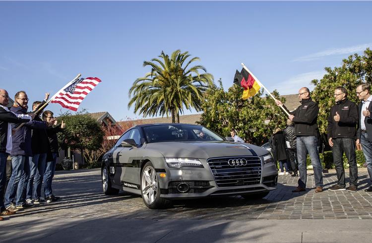 The Audi A7 piloted driving concept car is flagged off to start the 900km piloted drive from Silicon Valley to Las Vegas.