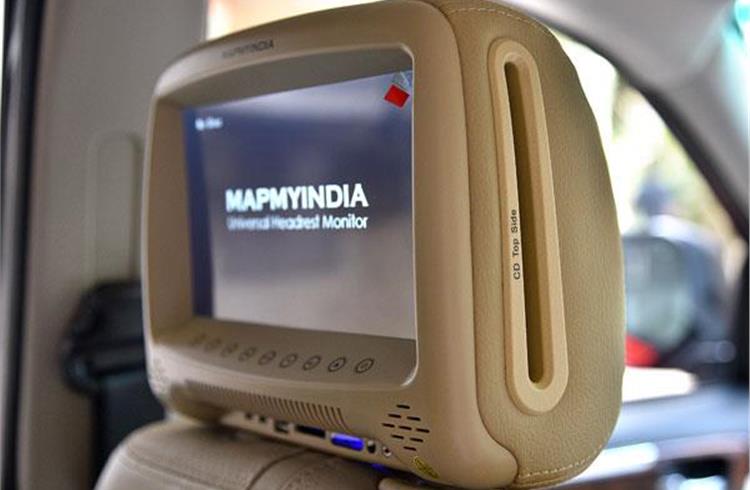 DVD players mounted in the front seat headrests.