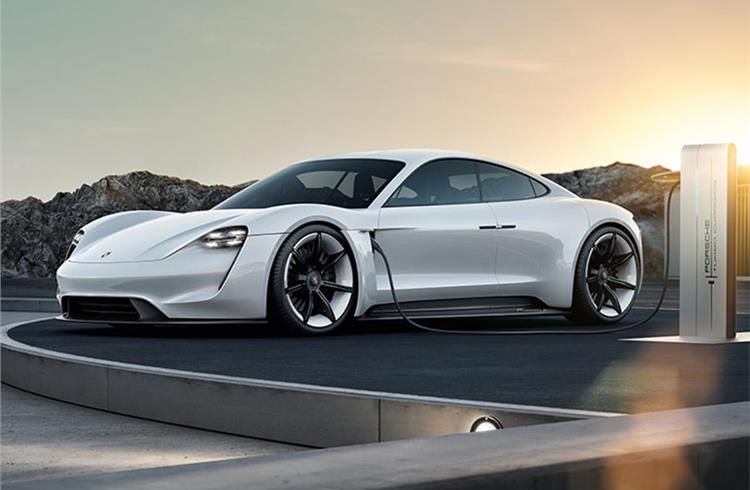 Porsche “will be one of the last automobiles with a steering wheel”