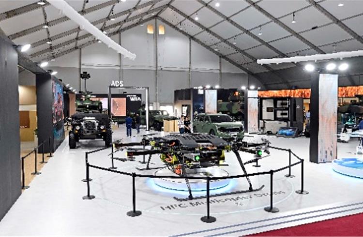 On display at the Kia Pavilion at ADEX 2023: (L-R) a medium-sized chassis, hydrogen fuel cell multi-copter drone, EV9 military concept car, and a hydrogen fuel cell military drone concept.