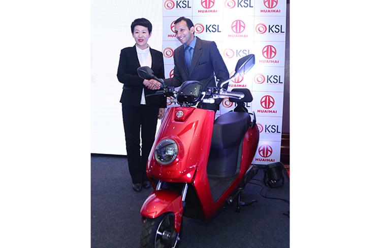 Dhiraj Bhagchandka, managing director, KSL Cleantech and Cathrine Xing, director, Huaihai Holding Group & GM for international business showcasing the electric vehicle range in New Delhi