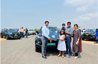 A proud family takes delivery of its EV