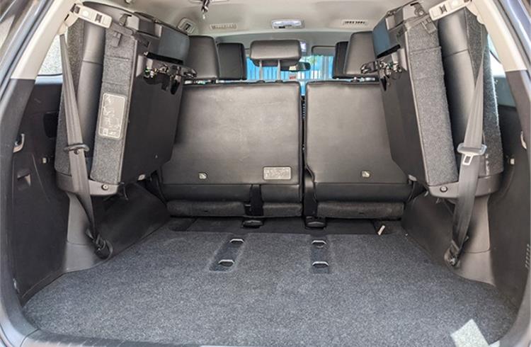 Reasonable boot space even beyond third row seats. Tail gate gets electronic operation as well as subwoofer.