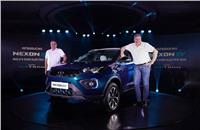 Guenter Butschek, CEO and MD, Tata Motors and Shailesh Chandra, President – Electric Mobility Business & Corporate Strategy, Tata Motors unveil the Nexon EV in Mumbai. 